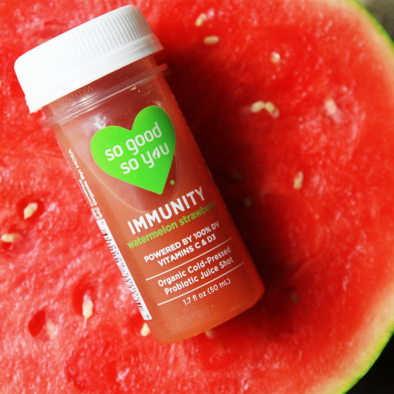 
                      
                        Immunity Watermelon Strawberry Juice Shot on a raw watermelon
                      
                    