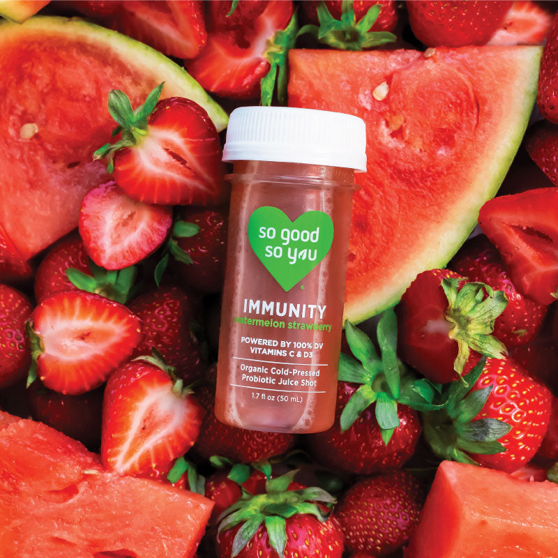 Immunity Watermelon Strawberry Juice Shot on raw watermelon and strawberries